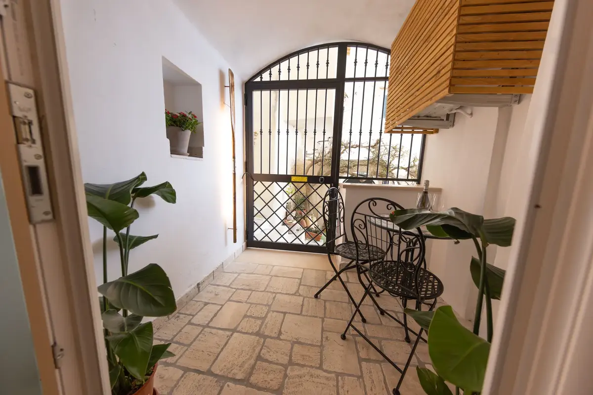 Direct view of the Caves of Tiberius from the outdoor porch, where every sunset becomes an unforgettable memory.